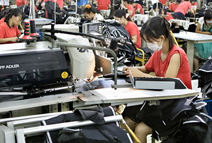 從手工服裝生產(chǎn)小作坊到民營(yíng)企業(yè)500強(qiáng)